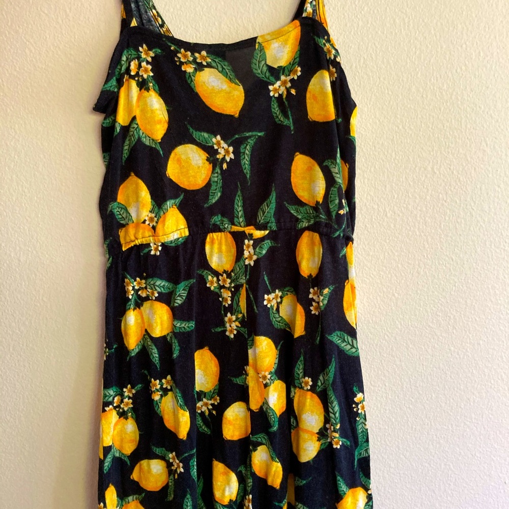 Black and yellow romper with lemon design